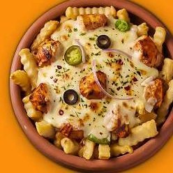 Matka pizza in a clay pot